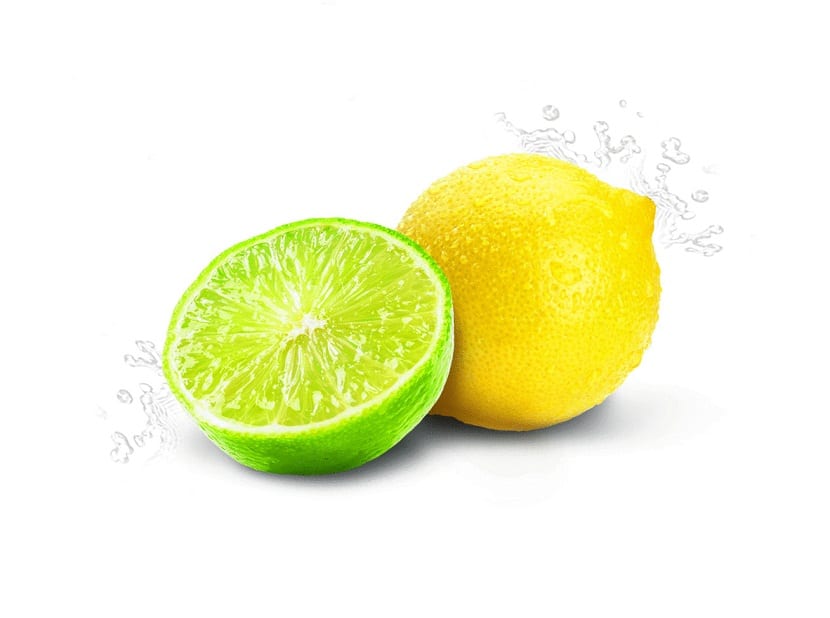 Lima cortada por la mitad junto a un limón entero sobre fondo blanco