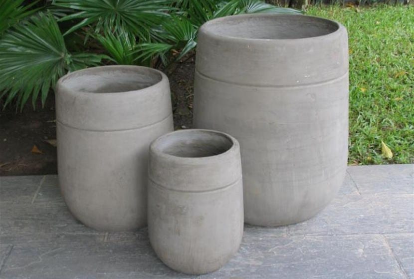 Macetas de cemento hechas a mano con plantas