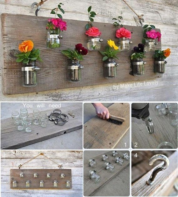 Macetero de pared con frascos de vidrio reciclados